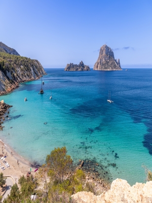 Vibrant,Scene,Of,Cala,Hort,Beach,,Ibiza,,Featuring,Anchored,Boats